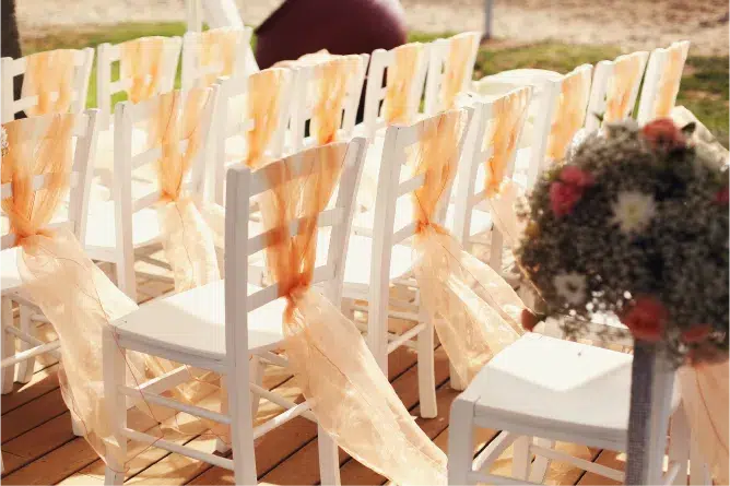 Close-up of chair rentals at a Clearwater, FL wedding, highlighting quality and style.